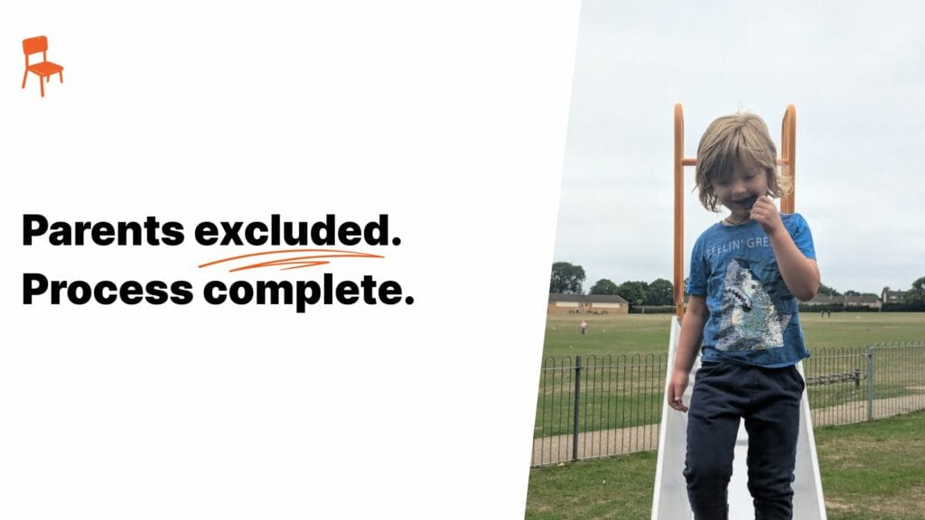 Parents excluded. Process complete. – Oliver standing at the bottom of a playground slide, holding a chewie, with a neutral expression.