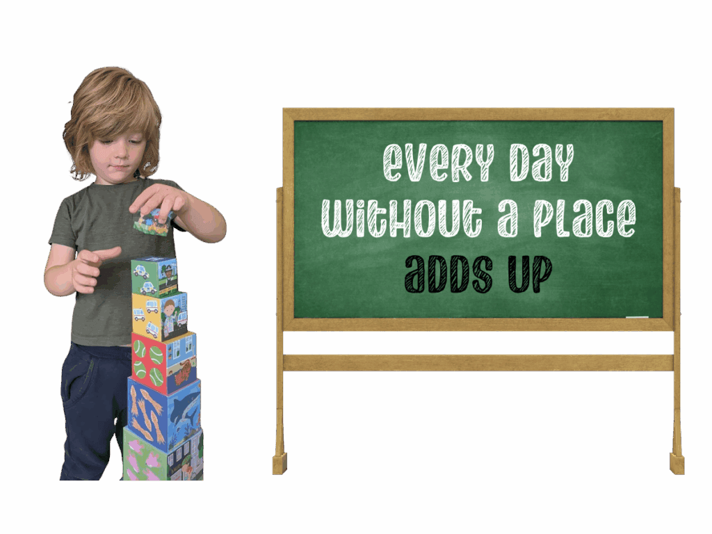 Oliver stacking colourful toy blocks beside a chalkboard that says “Every day without a place adds up.”